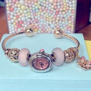 Pre-loved Authentic Pandora rose open bangle and charms. Bangle is a Size 7.5